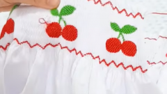 How to embroider cherry patterns on smocked fabric