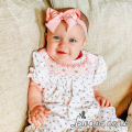 Lovely baby on floral geometric dress 