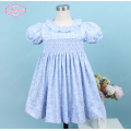 honeycomb-smocked-belted-dress-white-floral-on-blue-for-girl---ld522